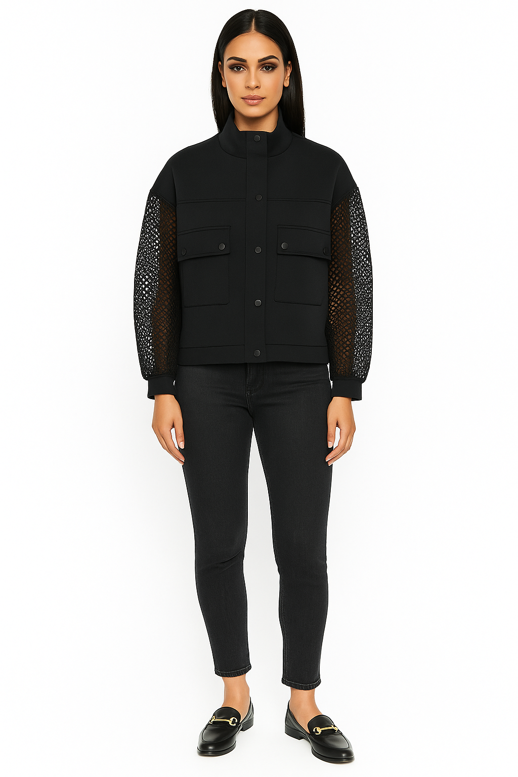 Juodas stilingas švarkelis su permatomomis rankovėmis ir didelėmis kišenėmis priekyje. Modelis visu ūgiu