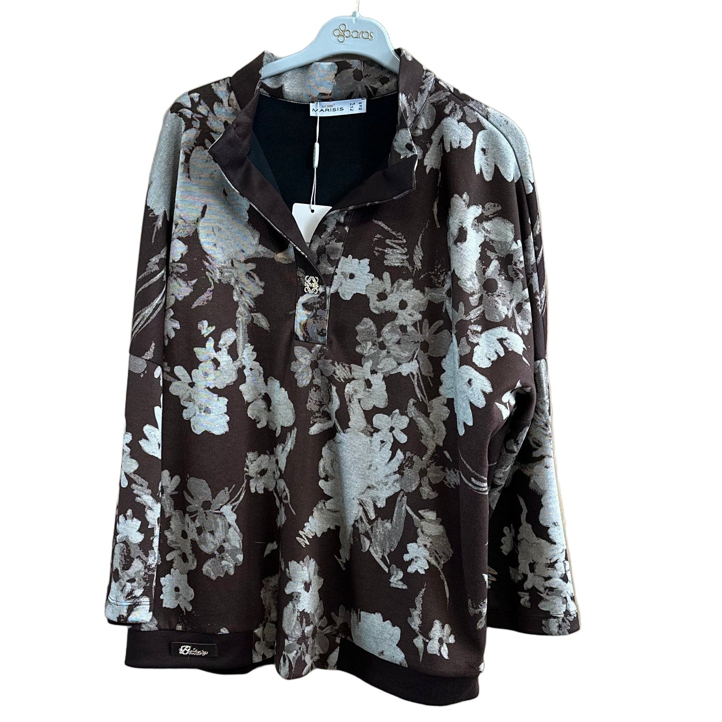 Didelių dydžių rudeniška palaidinė iš medvilnės, poliesterio ir elastano.