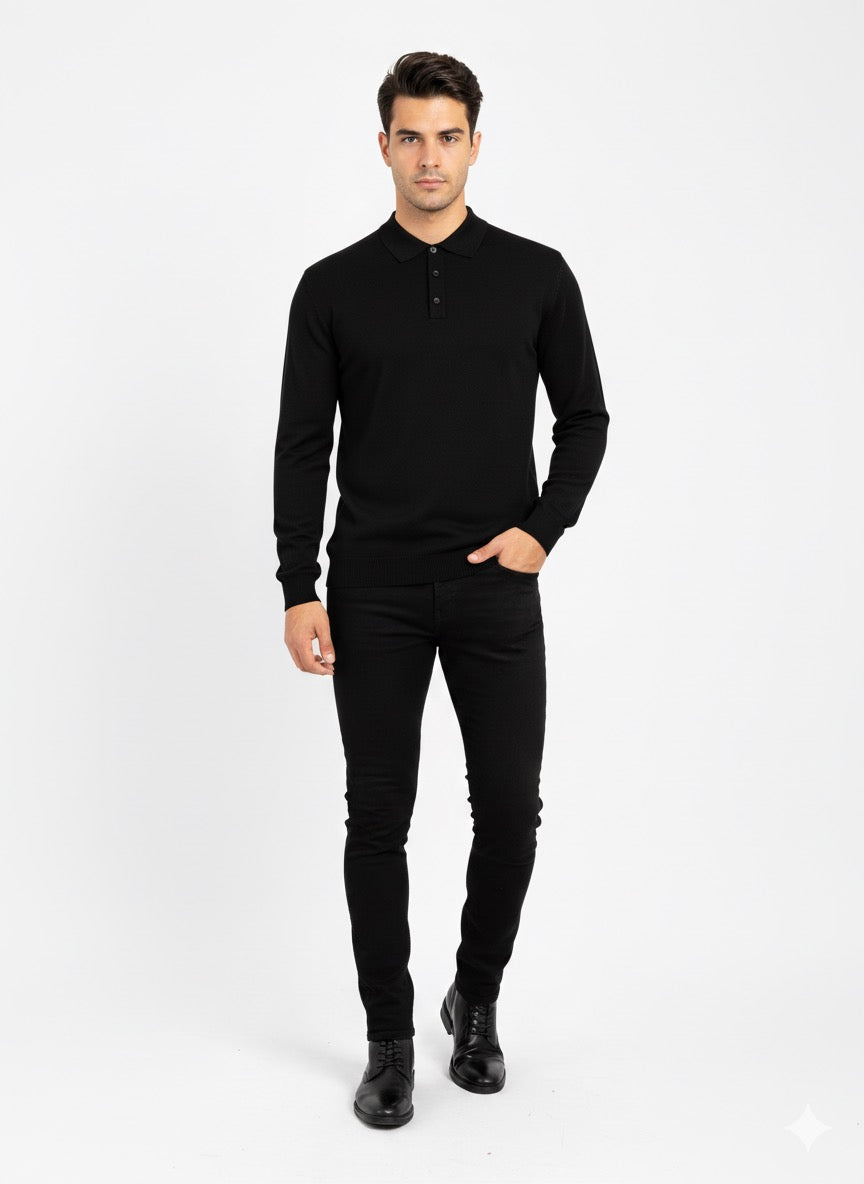 Man wearing a black long-sleeve shirt and black pants on a white background