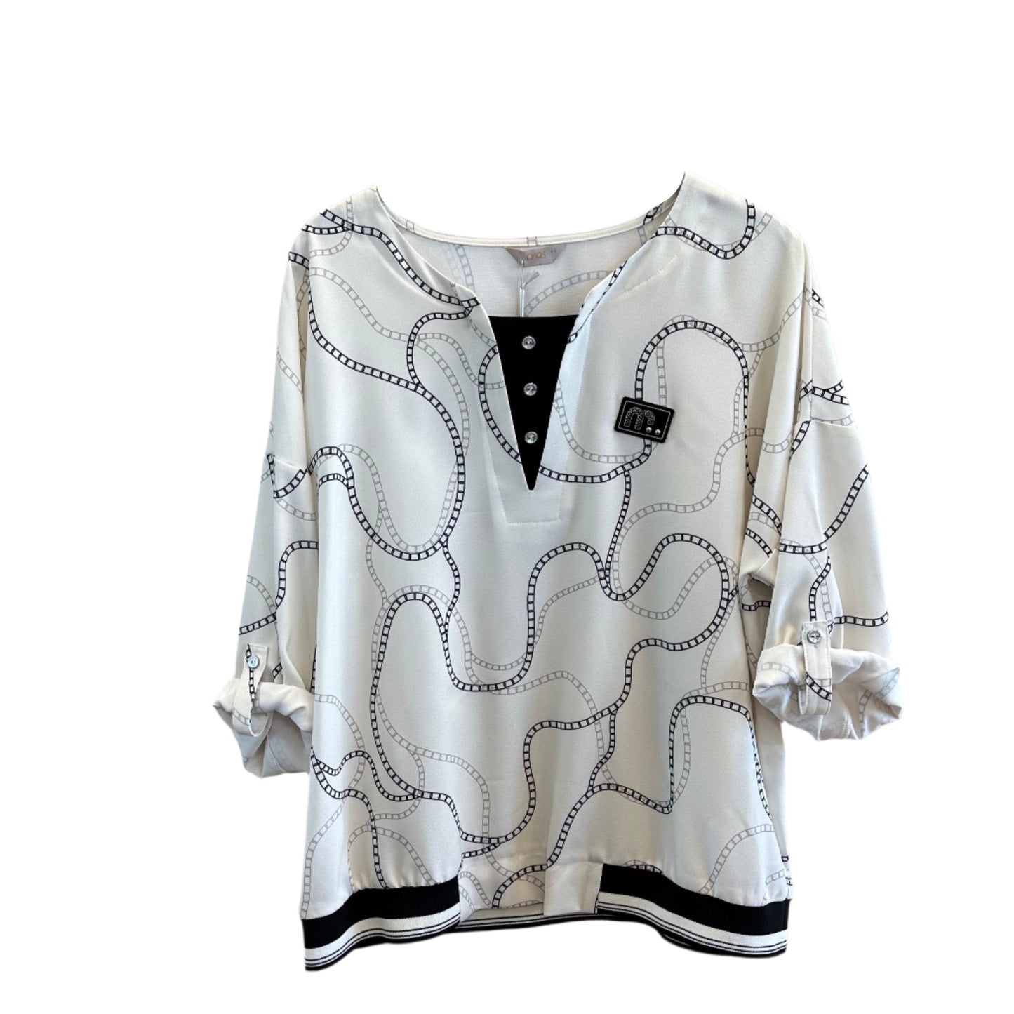 Lengva palaidinė su juodu dekoratyviniu įsiuvu ir raštu, pakabinta ant pakabos.