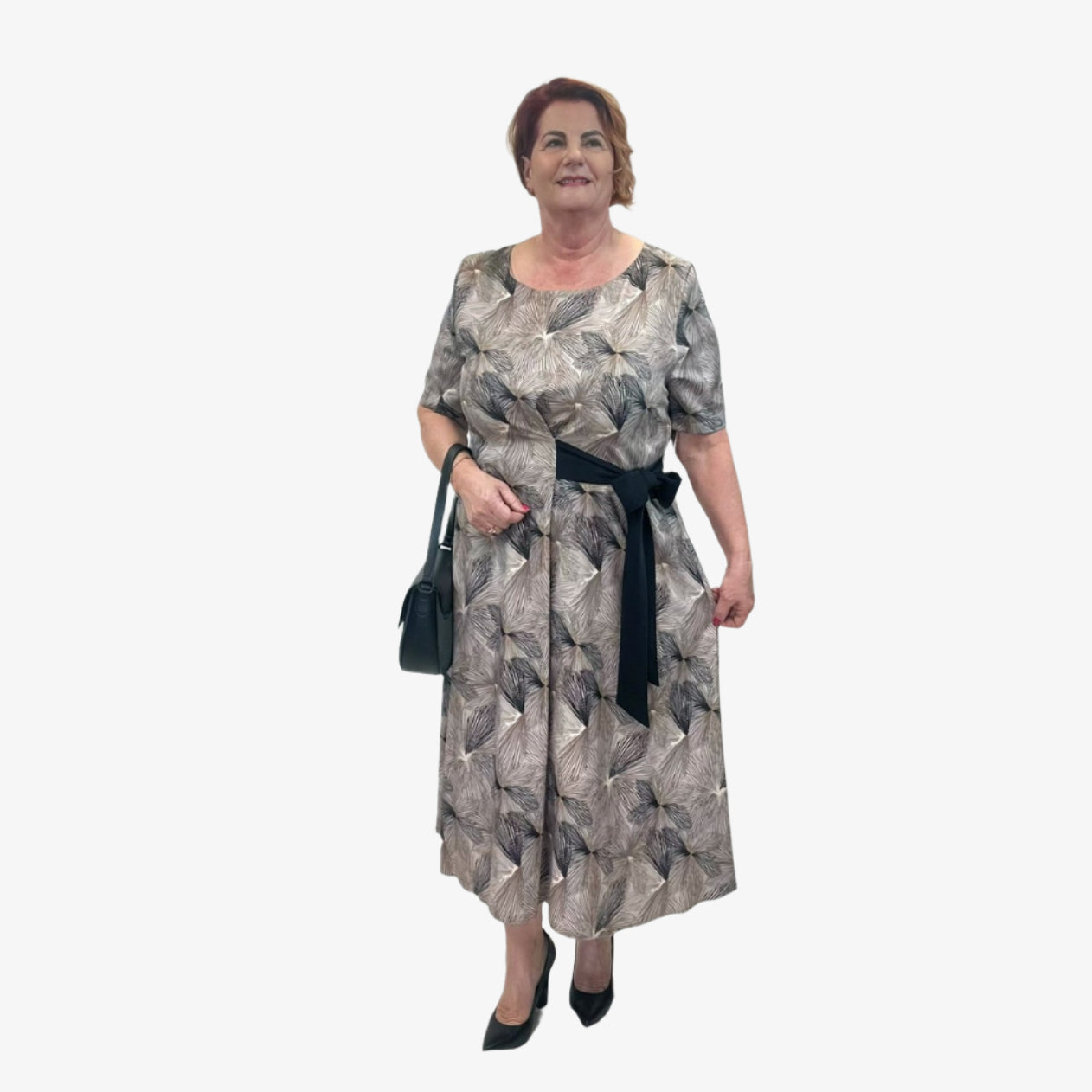 Ilga suknelė su lapų raštu, apvalia iškirpte ir pusilgėmis rankovėmis – vaizdas iš priekio.