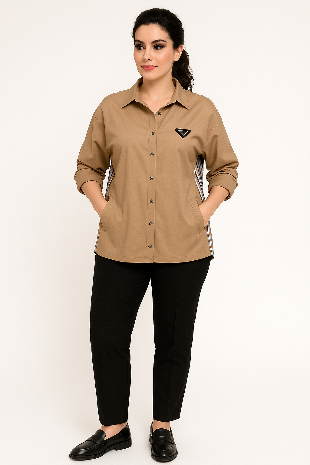 Woman wearing a beige shirt with a logo on a white background