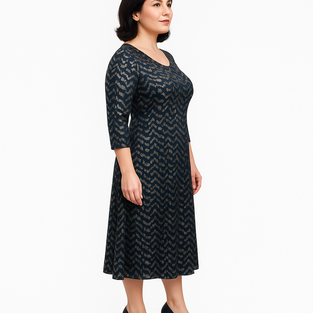 Woman wearing a black patterned dress on a white background
