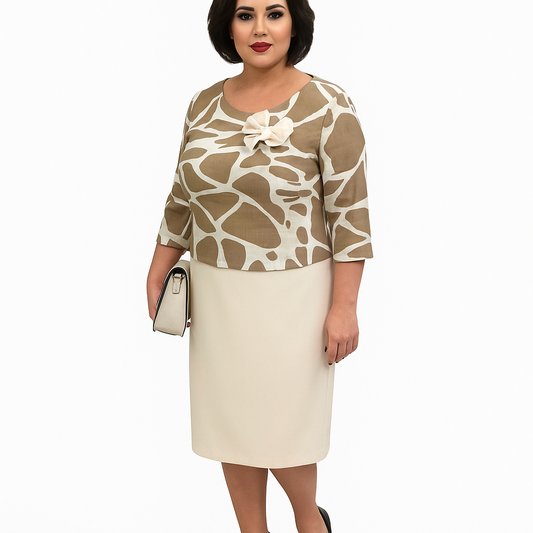 Woman wearing a beige and brown patterned top with a white skirt on a white background