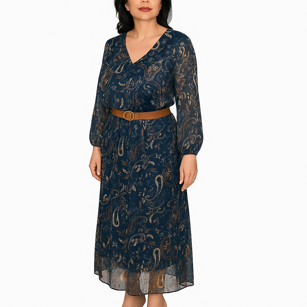 Woman wearing a dark blue patterned dress with a brown belt on a white background