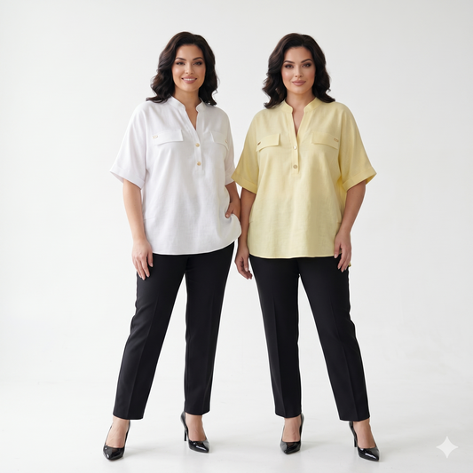 Two women wearing white and yellow button-up shirts with black pants on a white background