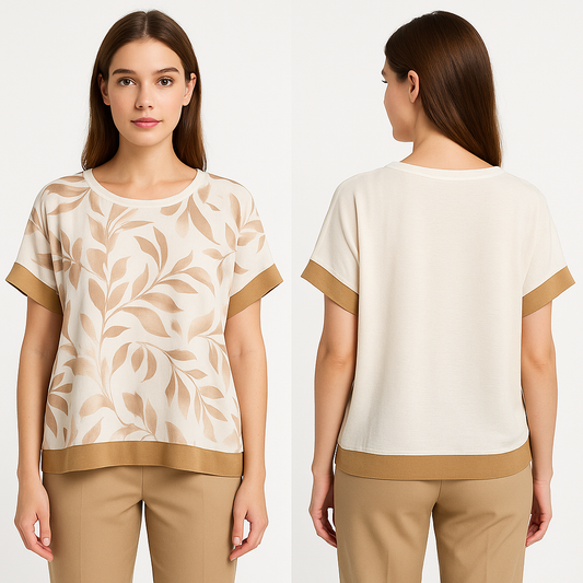 Modelis vilki šviesią, gėlėto rašto palaidinę trumpomis rankovėmis. Laisvo kritimo siluetas, šviesus fonas ir šiltų rudų atspalvių motyvas išryškina pavasarišką stilių. Palaidinė derinama su šviesiais džinsais, sukuriant lengvą ir jaukų įvaizdį laisvalaikiui ar kasdienai.