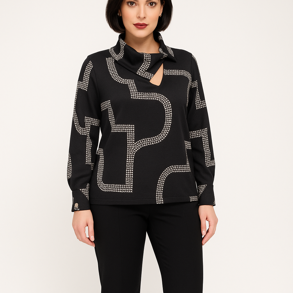 Black sweater with silver embellishments worn by a model on a white background