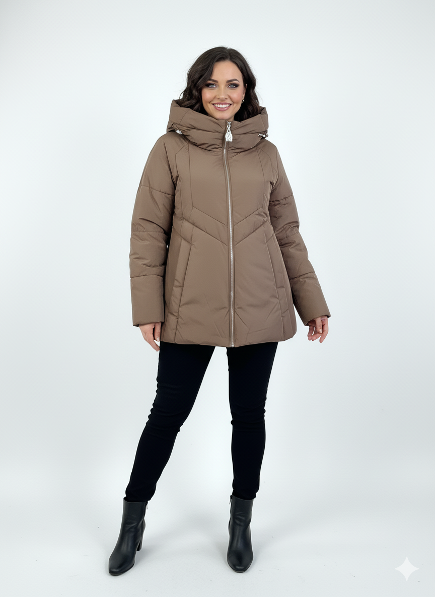 Woman wearing a brown puffer coat on a white background