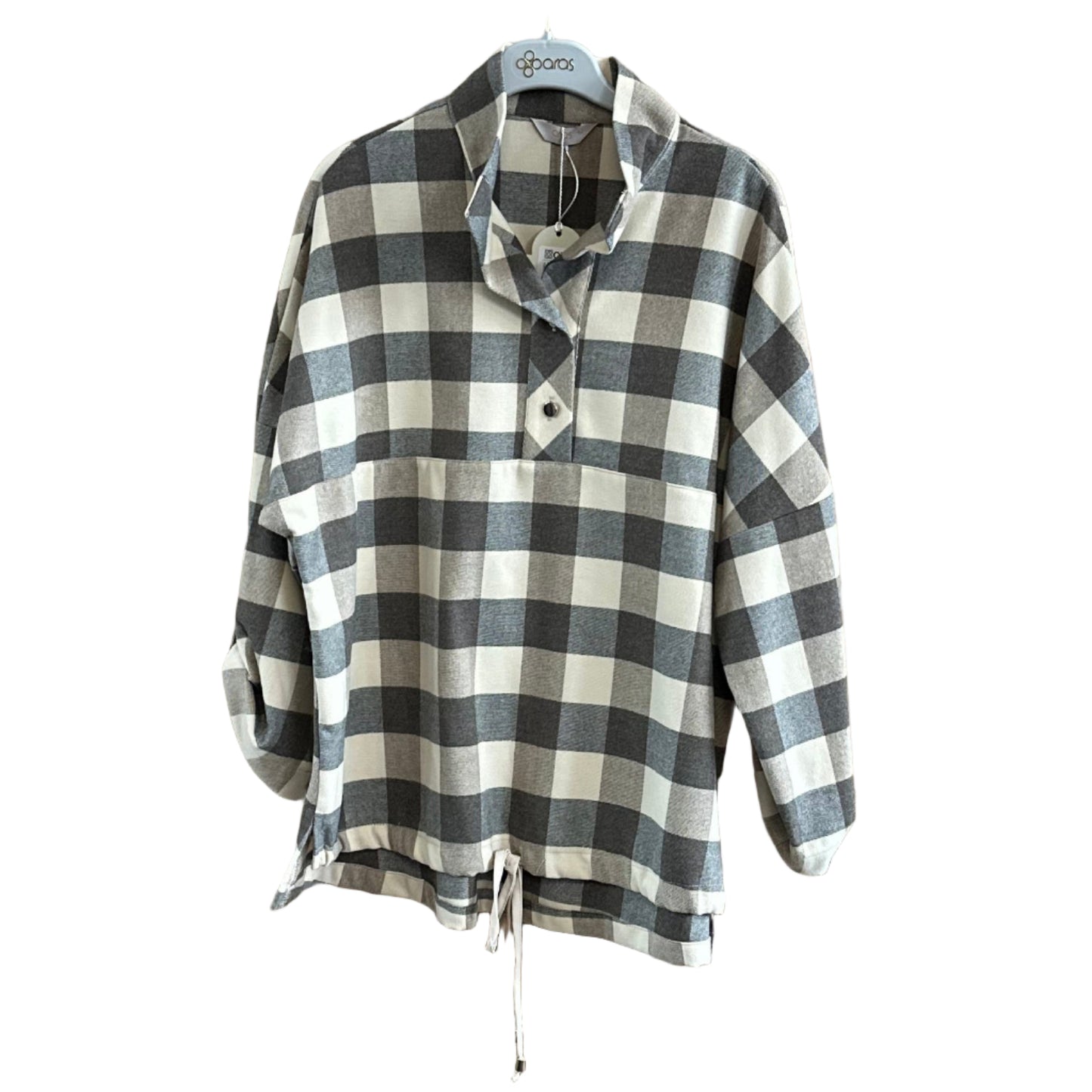Checkered shirt on a wooden board with a clothing store background