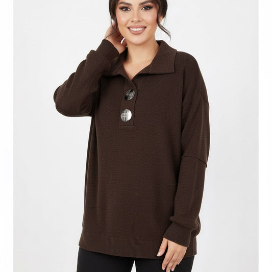 Woman wearing a brown long-sleeve top with a collar on a white background