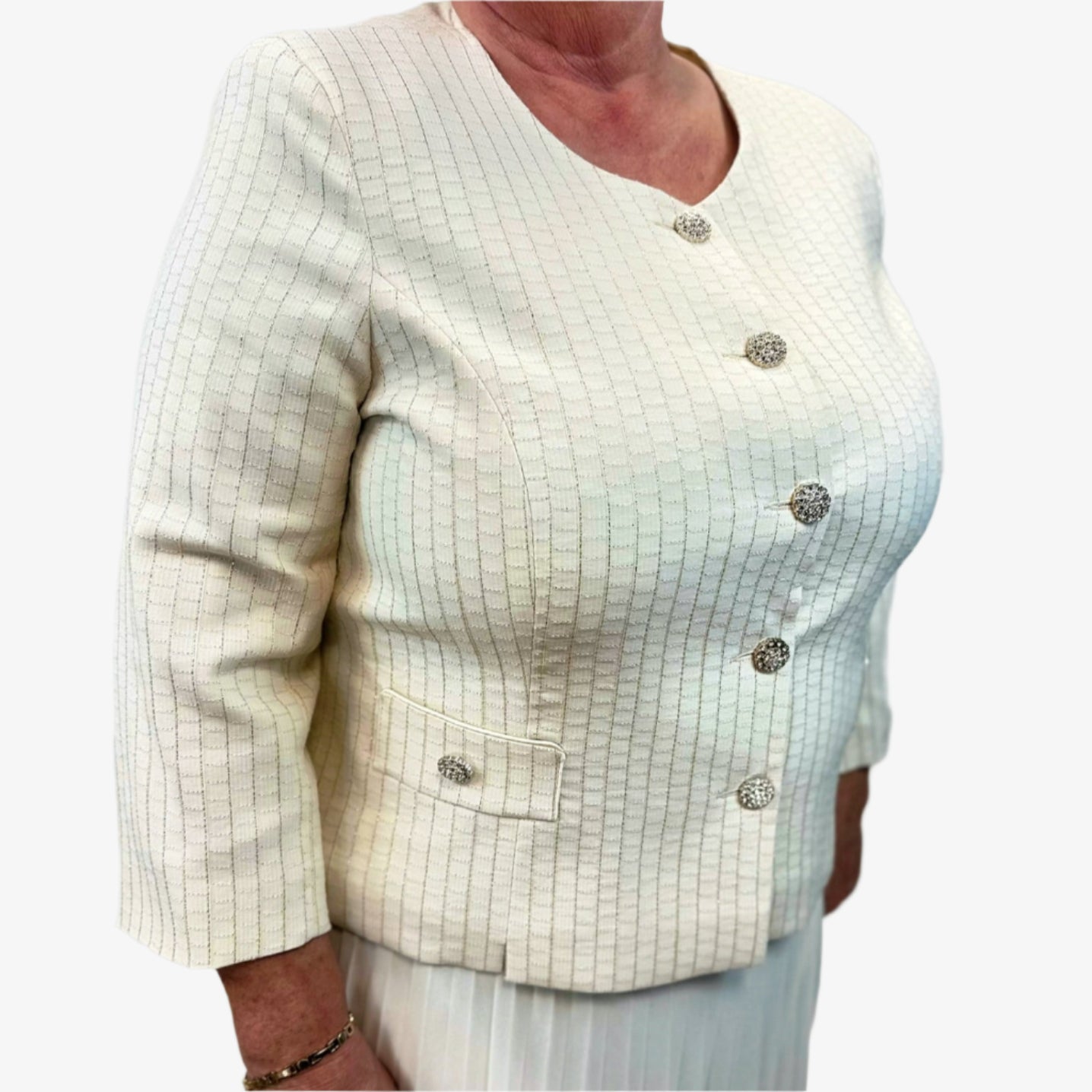 Detalė: kostiumėlio tekstūra ir siuvimo kokybė