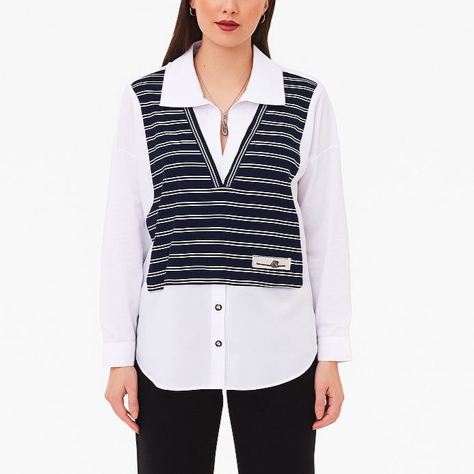 Woman wearing a white shirt with a black and white striped vest on a white background